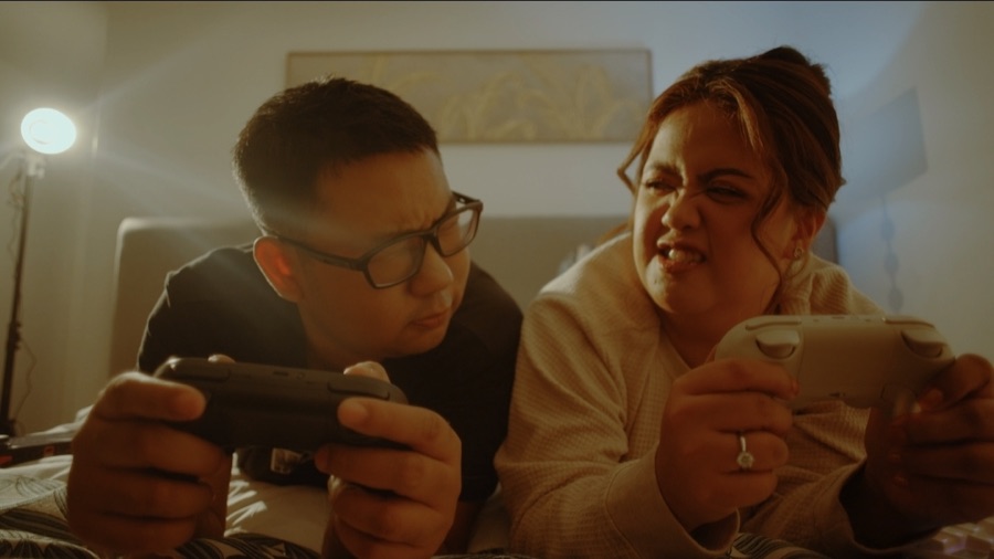 Mc Rosen and Krizza Lou playing video games